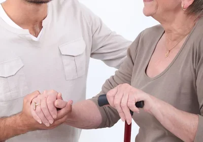 7-depositphotos_7915283-stock-photo-young-man-helping-senior-woman